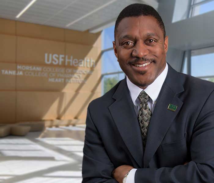 Dr. Kevin Sneed, standing in the lobby of the USF Health Downtown Facility.