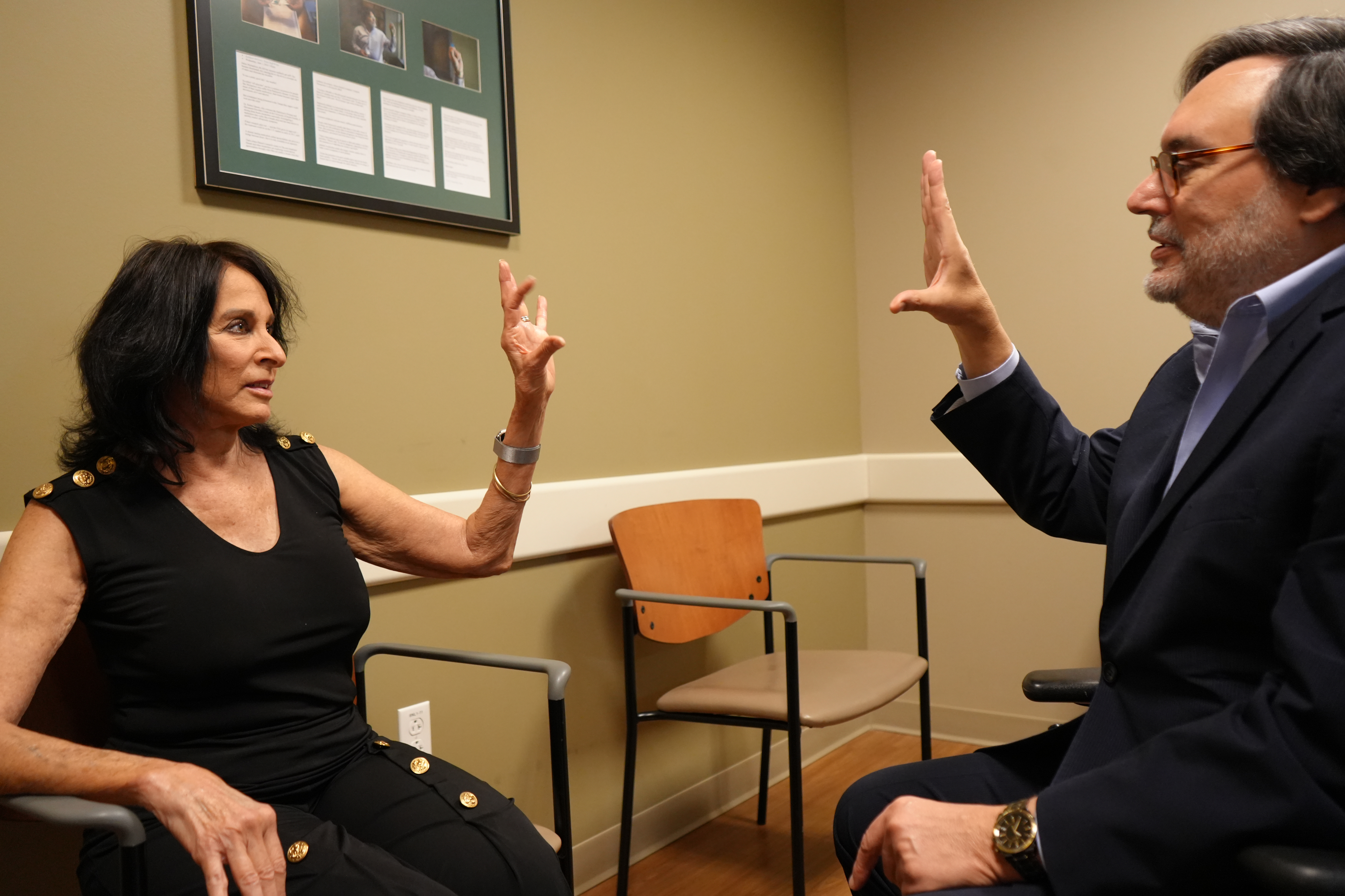 Dr. Hauser and a patient in the USF Health Parkinson's Center