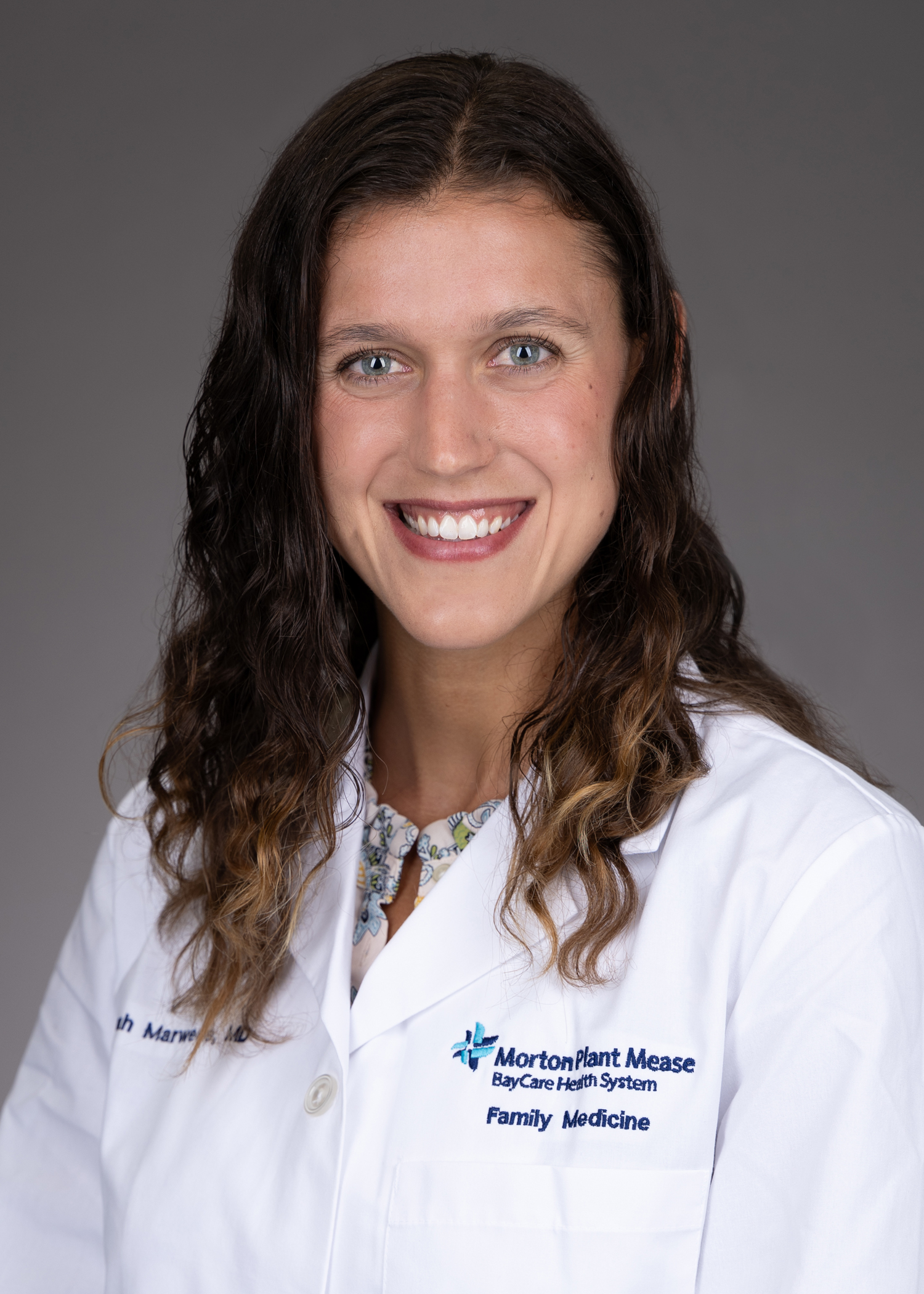 Hannah Marwede with USF Health Family Medicine Residency in a white lab coat