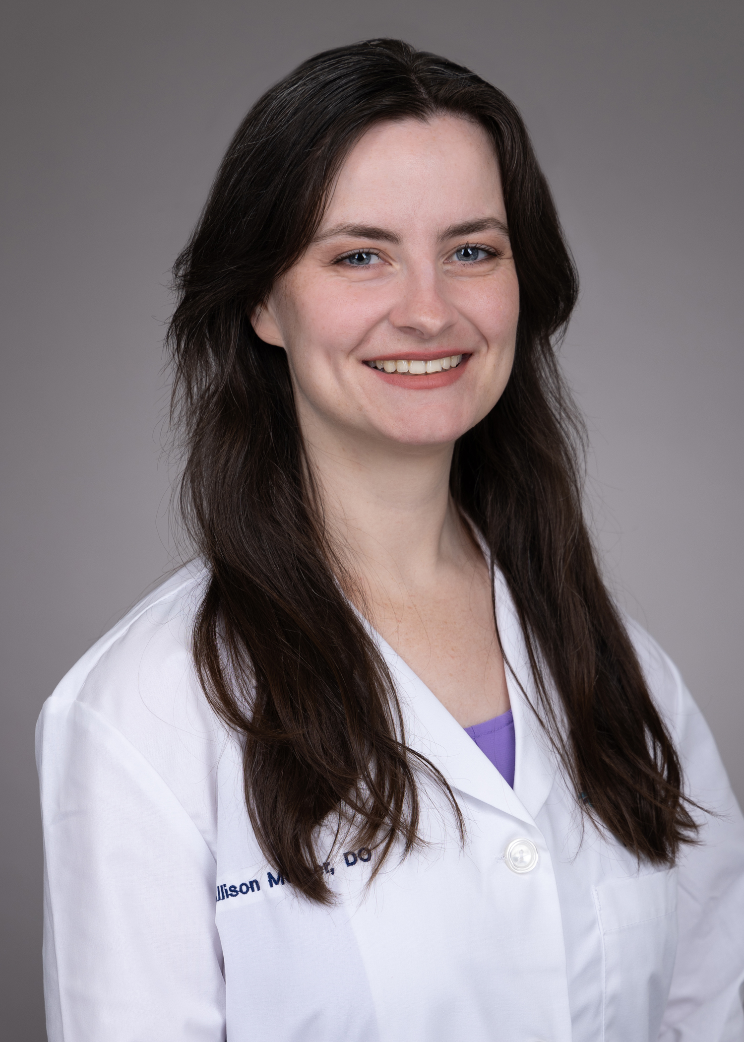 Allison Mercer with USF Health Family Medicine Residency in a white lab coat