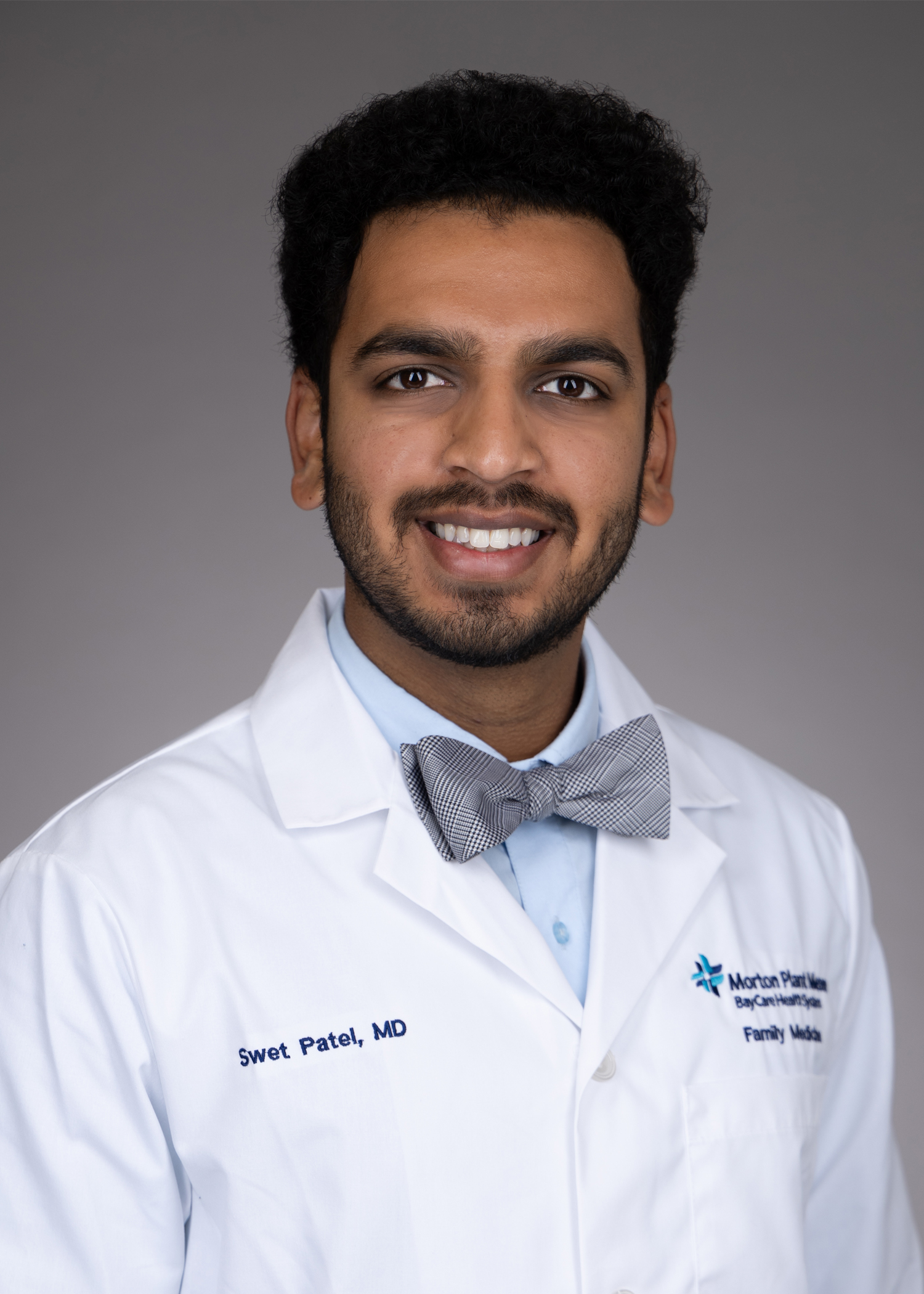 Swet Patel with USF Health Family Medicine Residency in a white lab coat