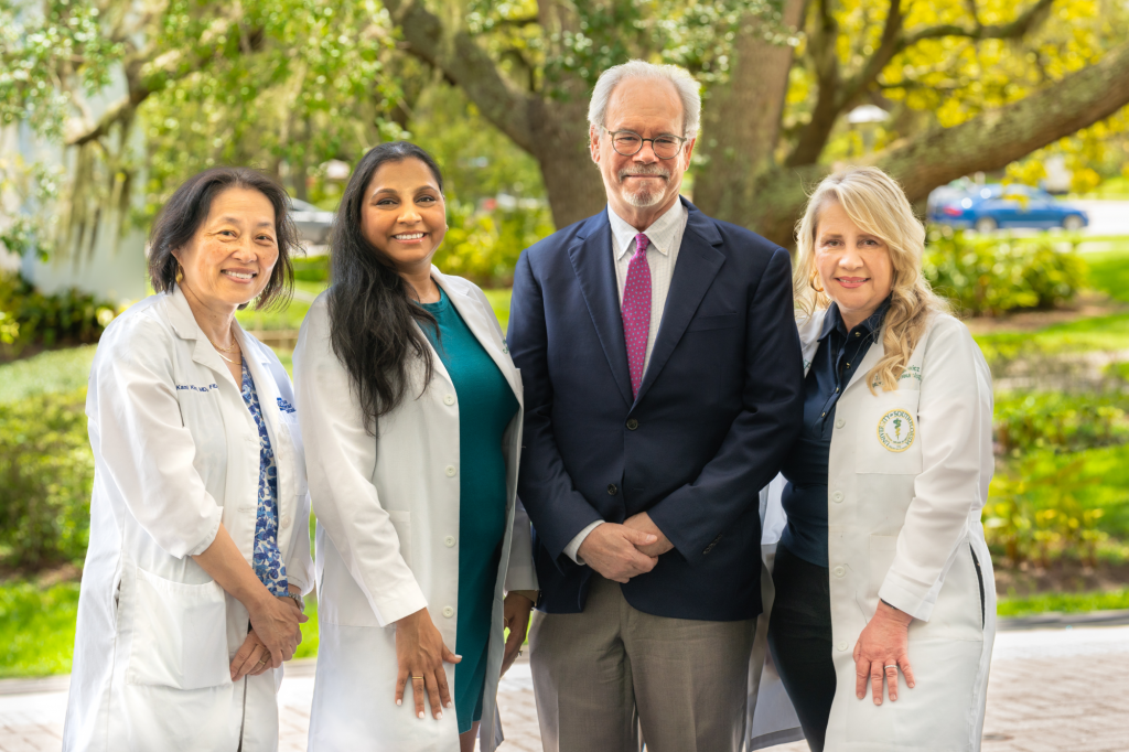 Picture of Dr. Kami Kim, Dr. Aarti Patel, Dr. Thomas McDonald, and Dr. Theresa Zesiewicz.