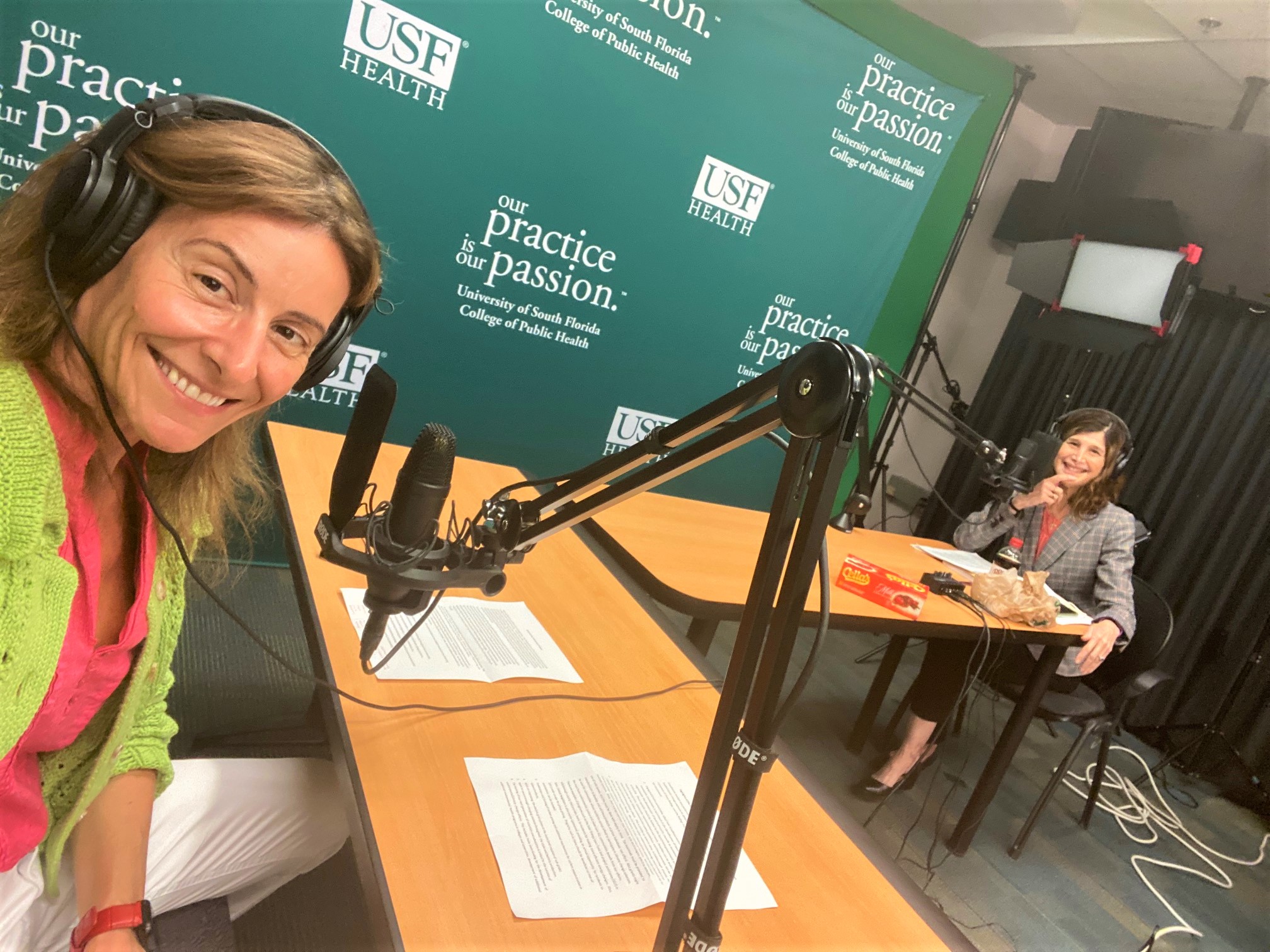 Dr. Karen Liller, host of the Activist Lab's podcast "Advocation - Change it Up!" sits in the studio with one of the featured guests on the show. 