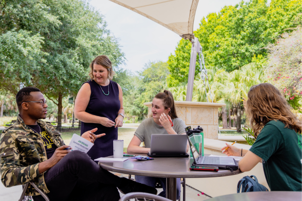 A group of students working at a table