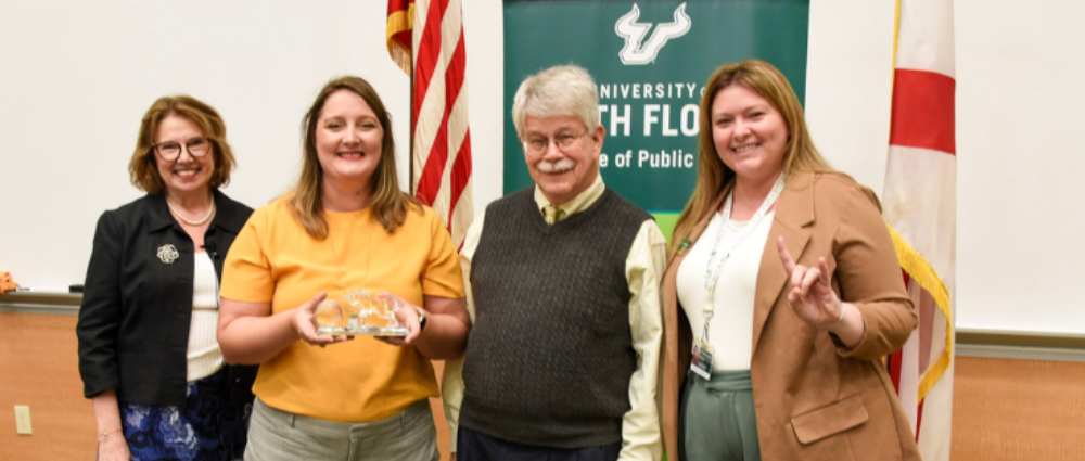 Drs. Janice Zgibor, Linsey Grove and Russell Kirby with Elizabeth Bannon at the COPH's National Public Health Week Annual Awards Ceremony