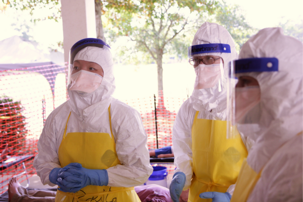 A group of public health students in protective gear