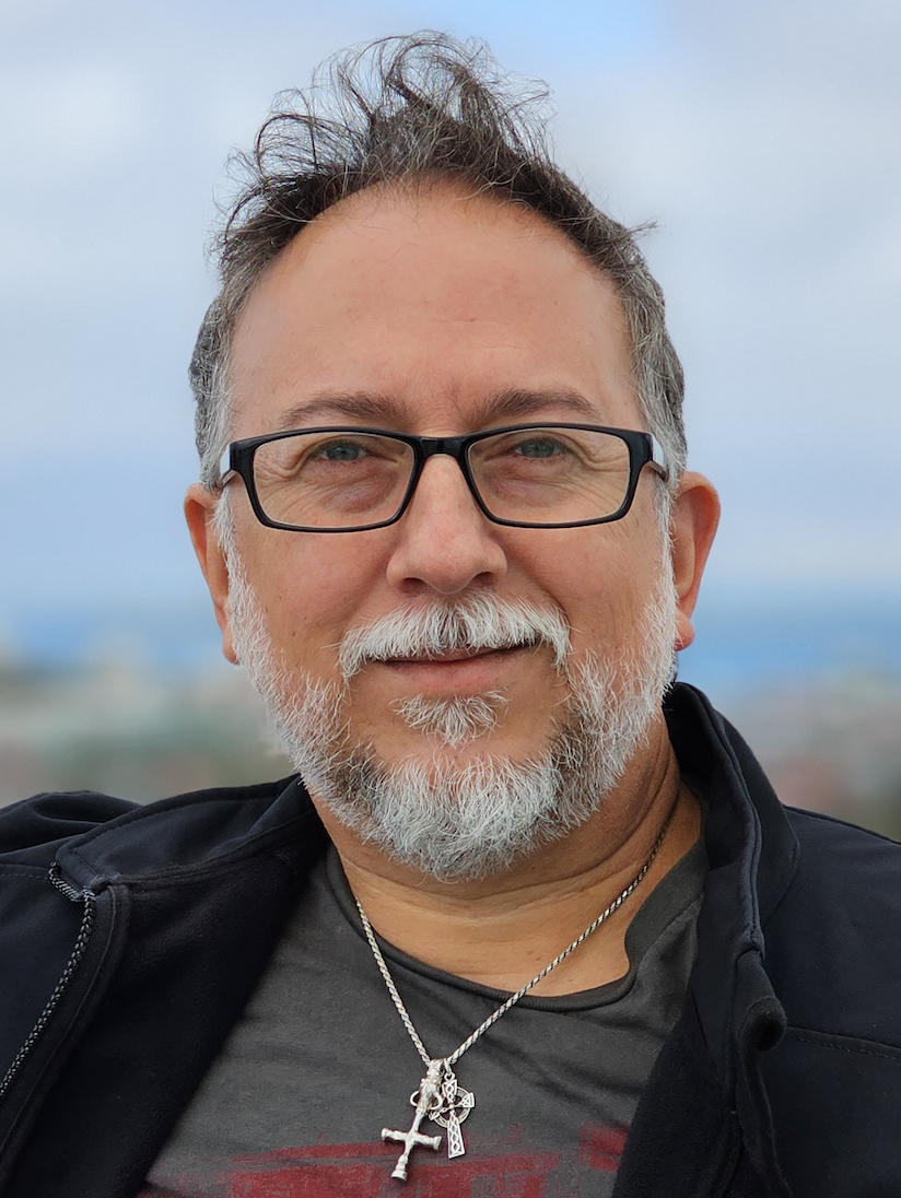 Headshot of Victor Morales in an outdoor setting