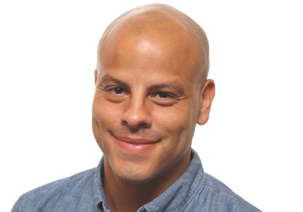 A headshot of Alexis Medina