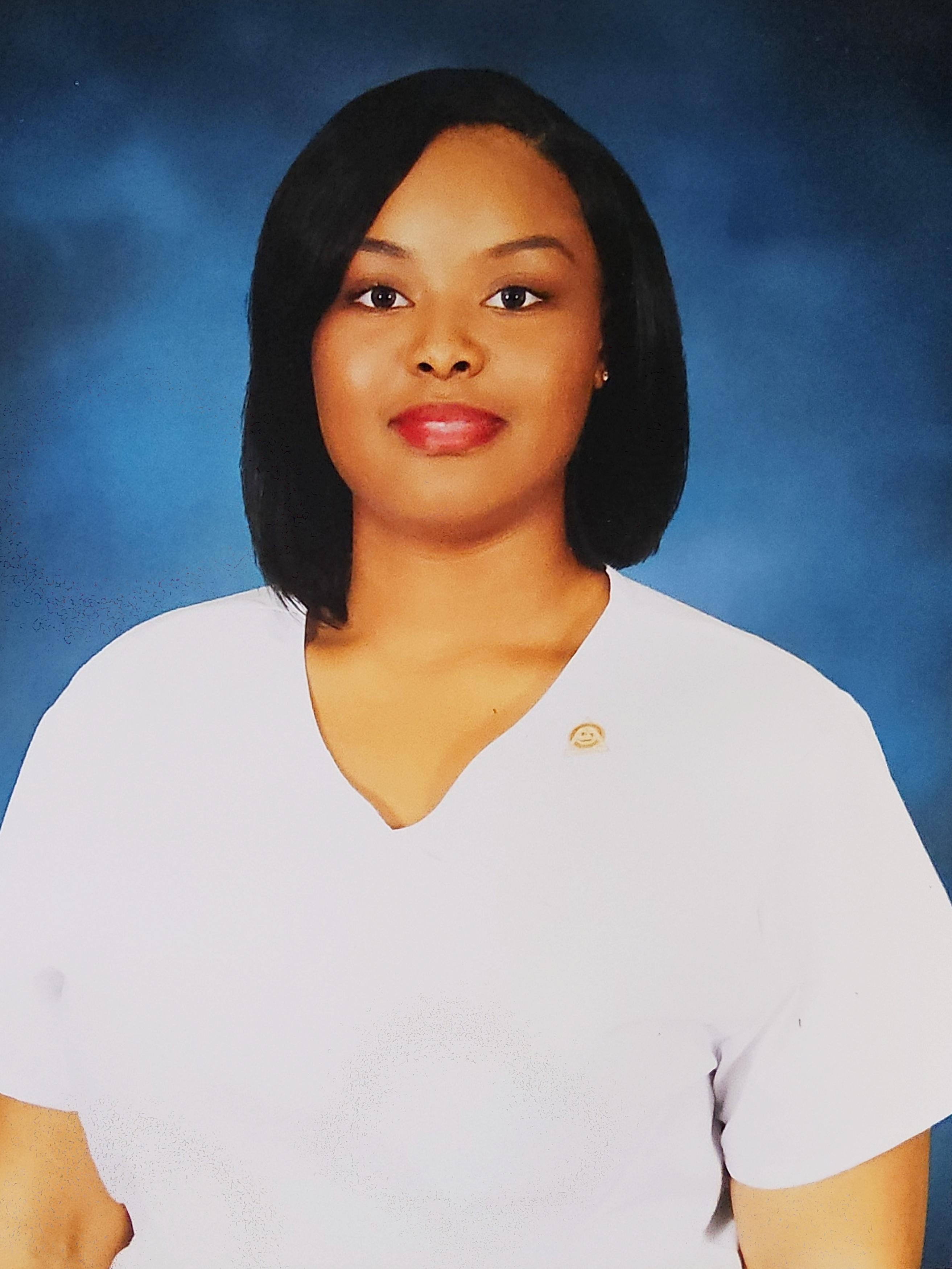 A headshot of Rodine Walker