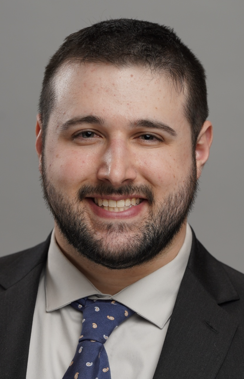 Headshot of Adam Jacobs