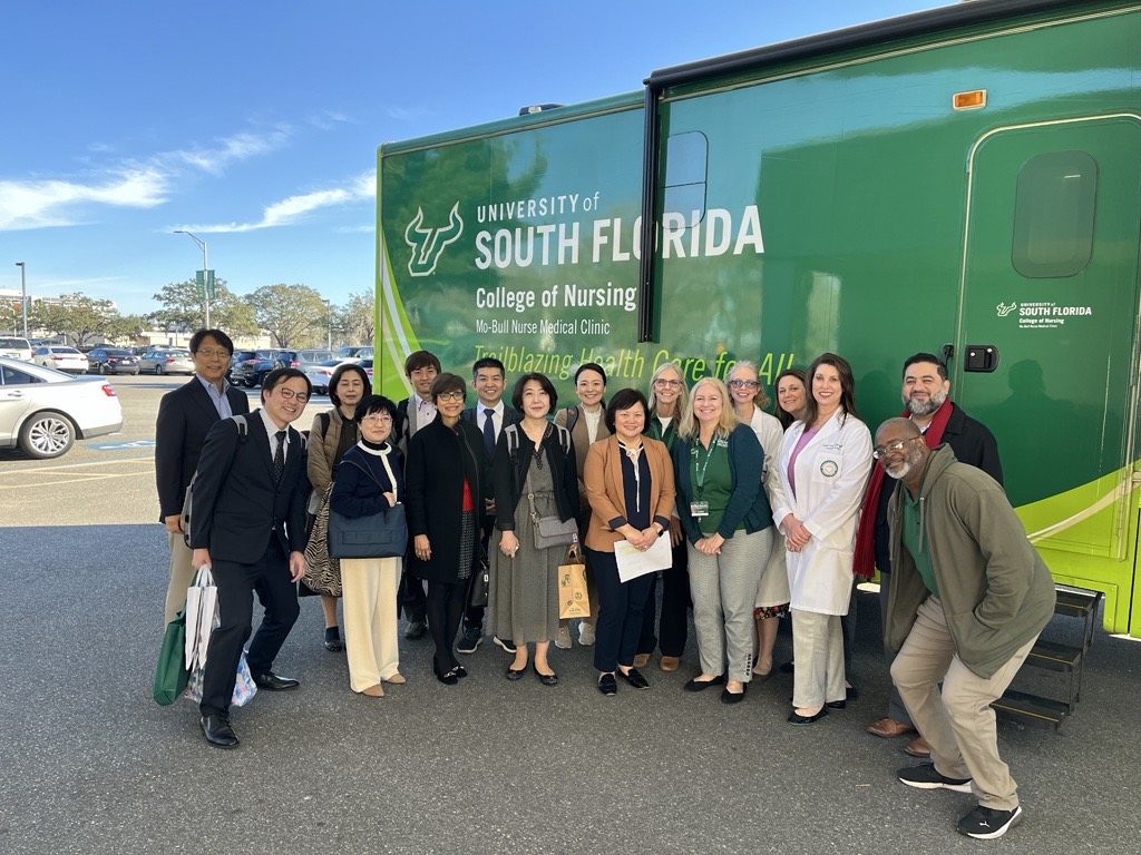 Delegates from the GIFU delegation in front of the Mo-Bull Clinic