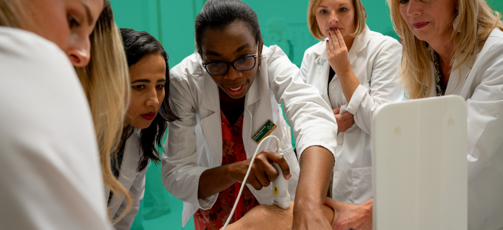 graduate nursing students conducting a knee ultrasound