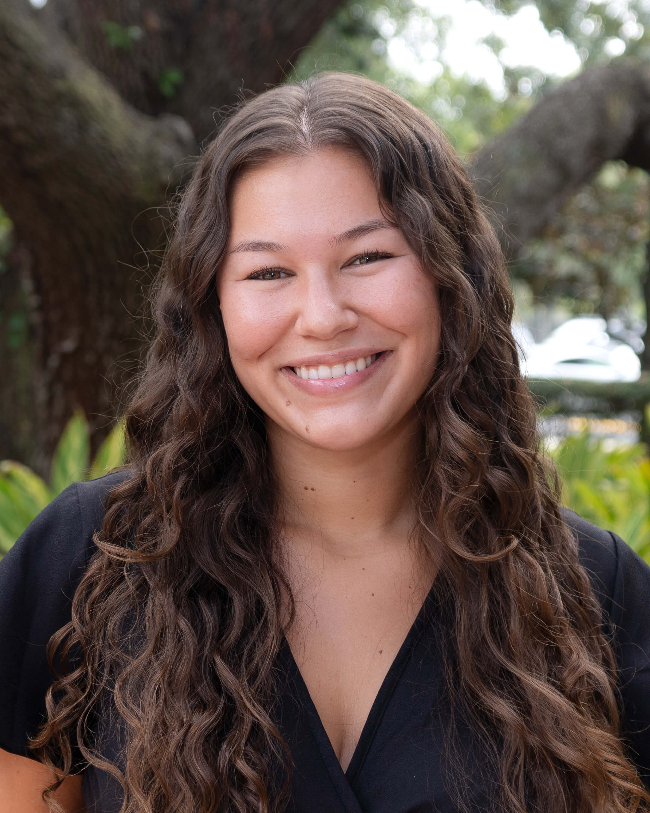 Daryn Mink smiling wearing a black blouse