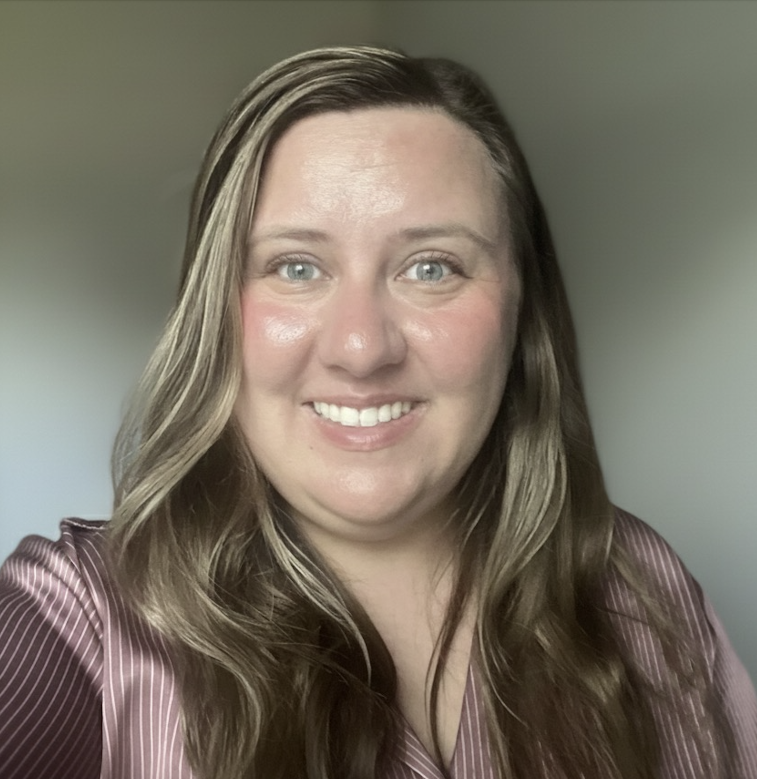 headshot photo of Caitlynn Runnells