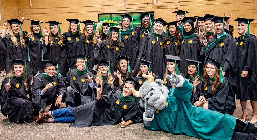 Graduates with Rocky the Bull