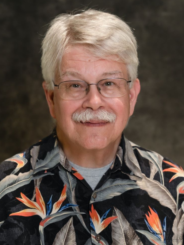 A headshot of Dr. Russell Kirby
