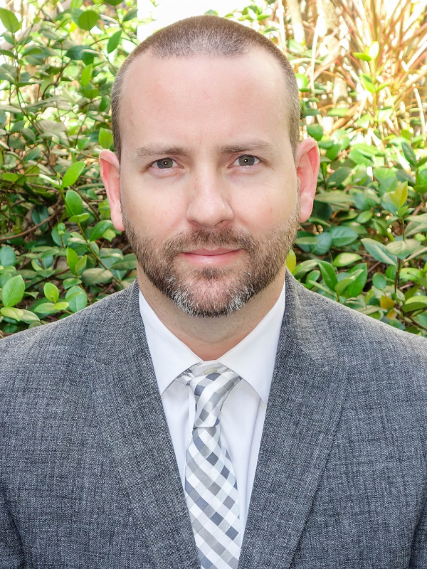 A headshot of Jean Paul Tanner