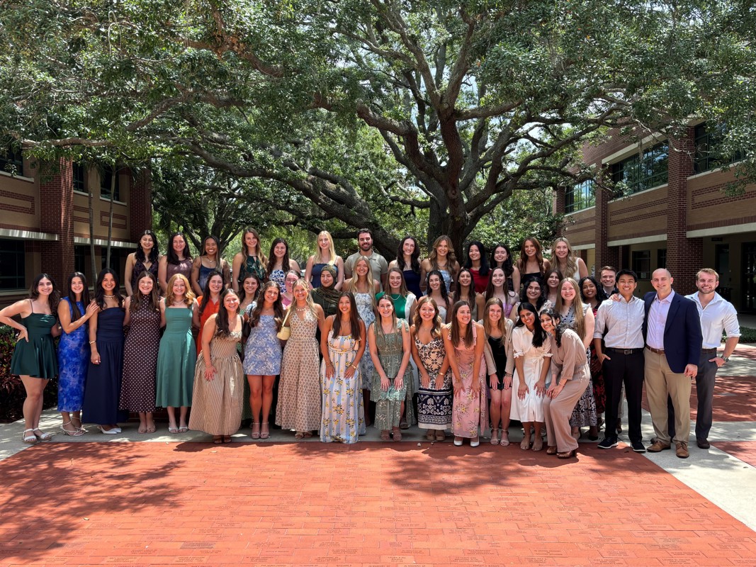 Large group of USF Health PA Program Alumni gathered in a group