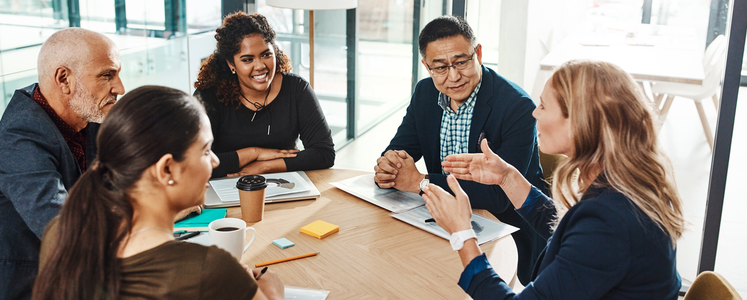 Shot of a team of businesspeople working together in a modern office