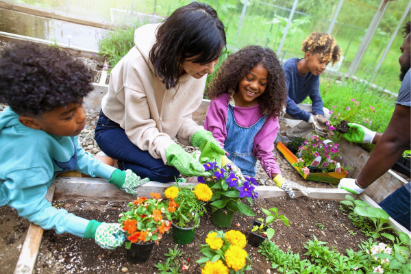 A group of people working together in a garden
