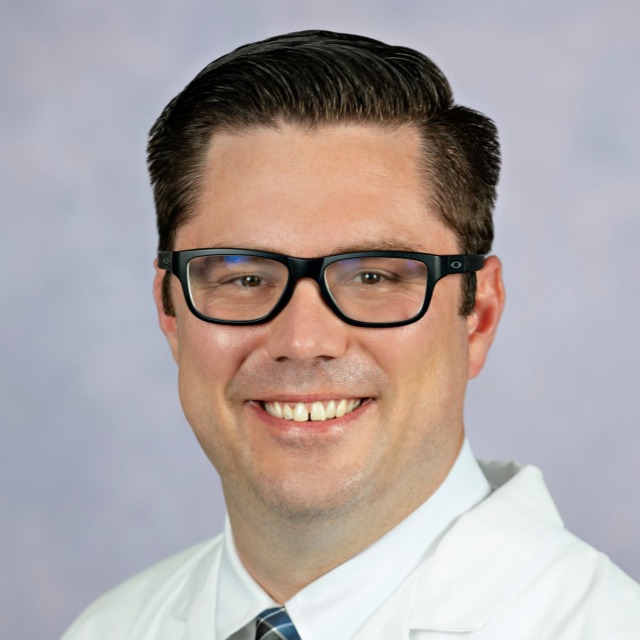 Nywening, Timothy headshot with white coat