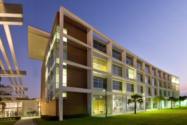 The exterior of the GHIDR Center building in the evening.