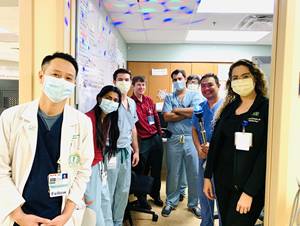 Infectious disease fellowship team standing for a group photo. 