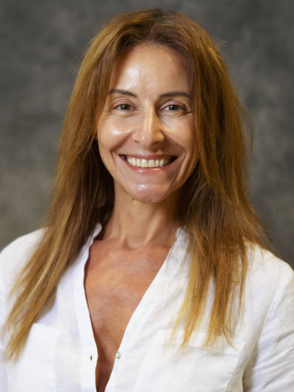 A headshot of Angela Markis