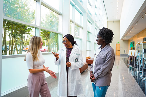 Dr. Oruche with PhD Students 