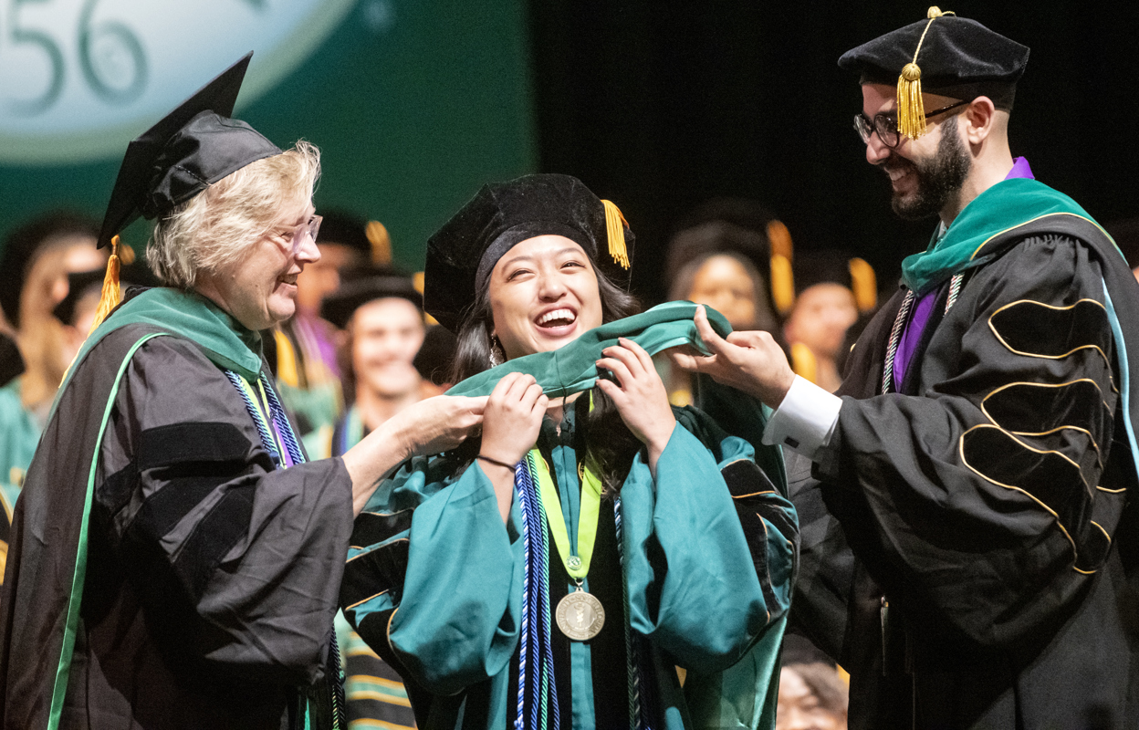 USF Health Medical student gets hooded at commencement ceremony