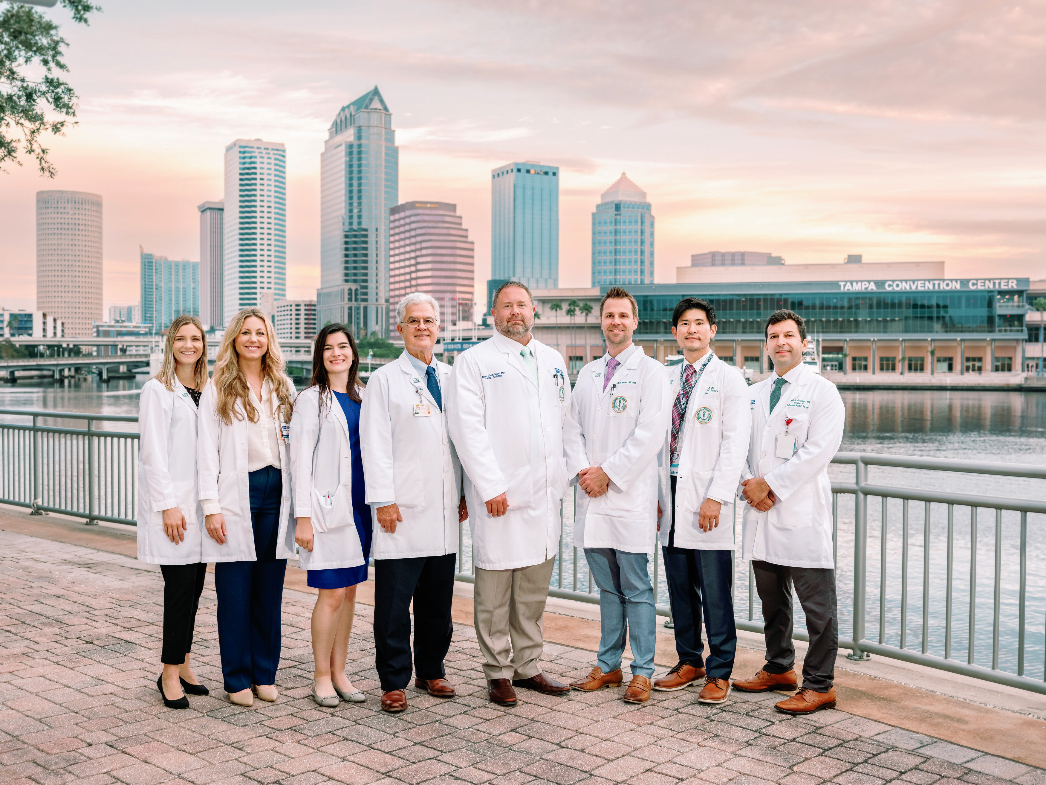 Colorectal Surgery providers standing by the bay in their white coats