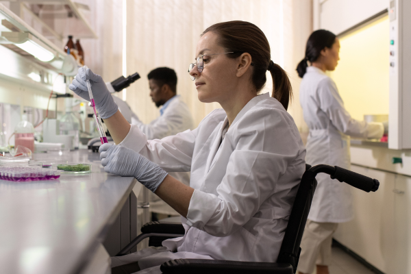 A person in a wheelchair working in a laboratory