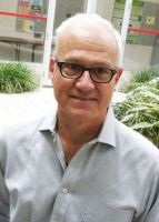 A headshot of James Van Elswyk