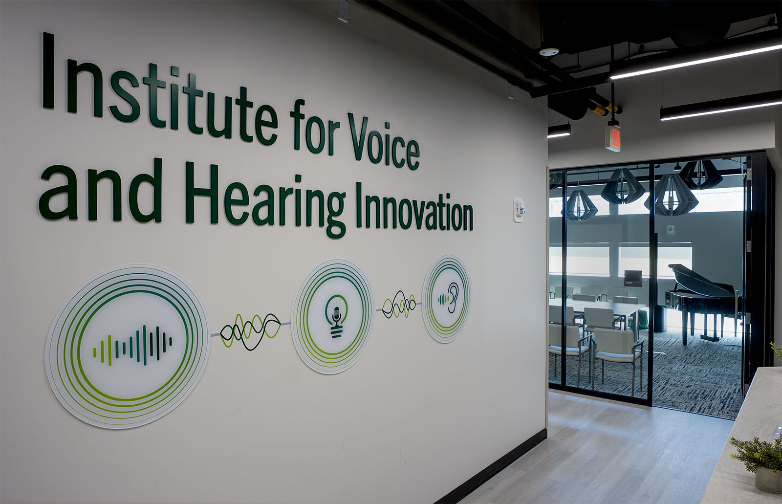 "Institute for Voice and Hearing Innovation" wording on the entry way of the office