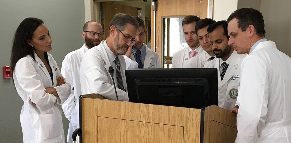 Program Director Mark Greenberg, MD, and residents