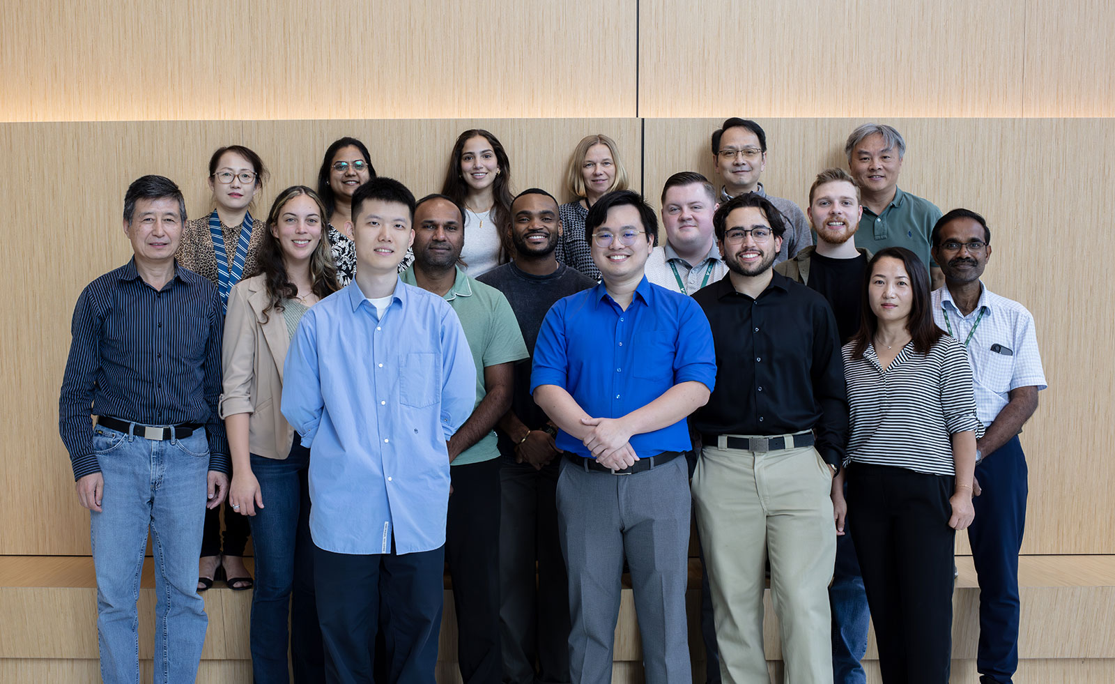 the USF-TGH Transplant Research Center faculty stand together in a group smiling