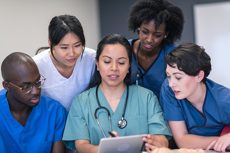 medical students shadowing health expert