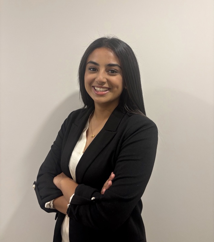 Professional headshot of Aarya Raval.
