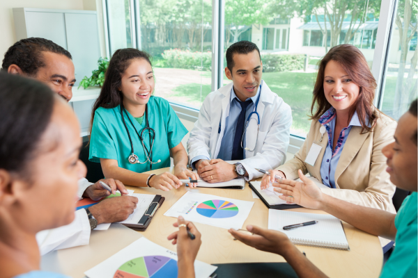 A group of public health professionals sitting around a table