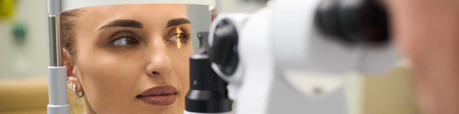 Woman getting an eye exam 