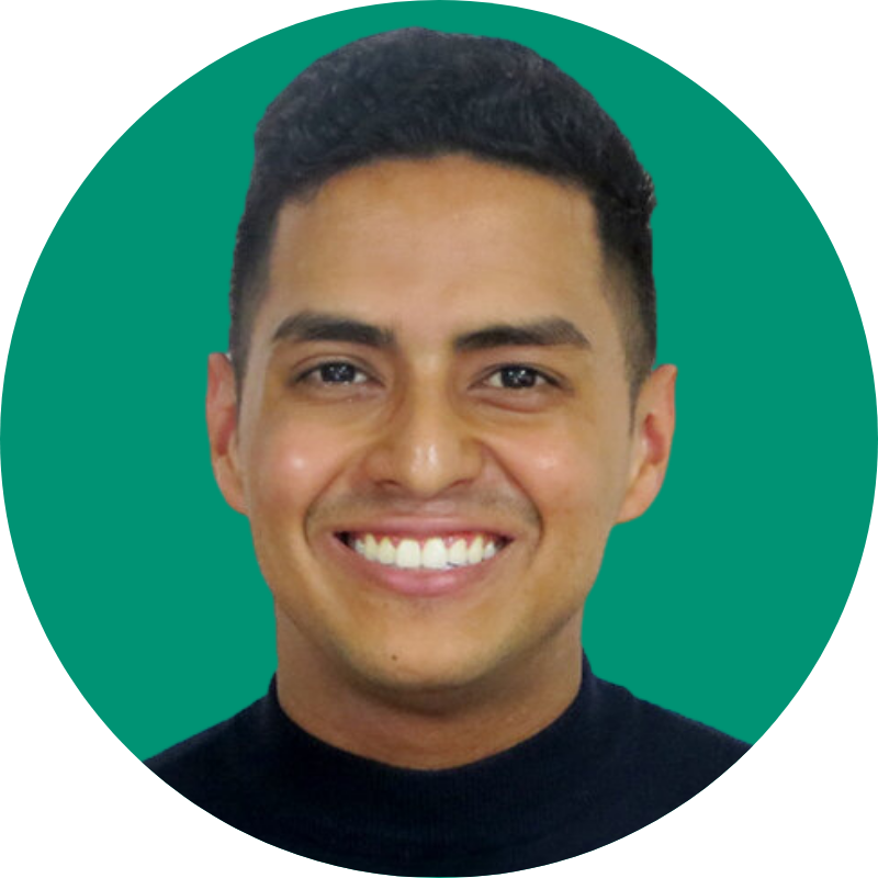 A headshot of Rolando Trejos Saucedo smiling in front of a green background