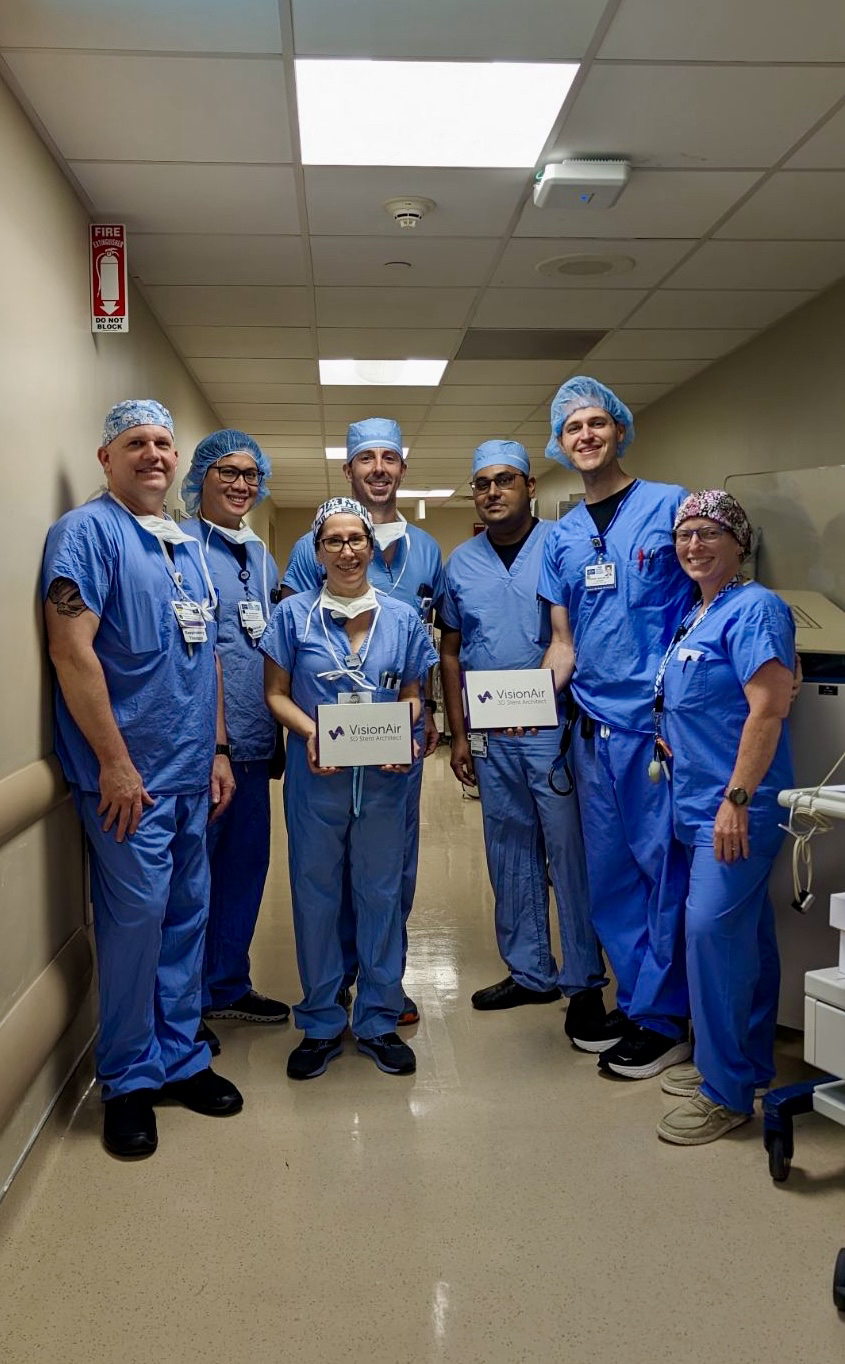 Seven USF Health Interventional Pulmonary Fellows in blue medical attire