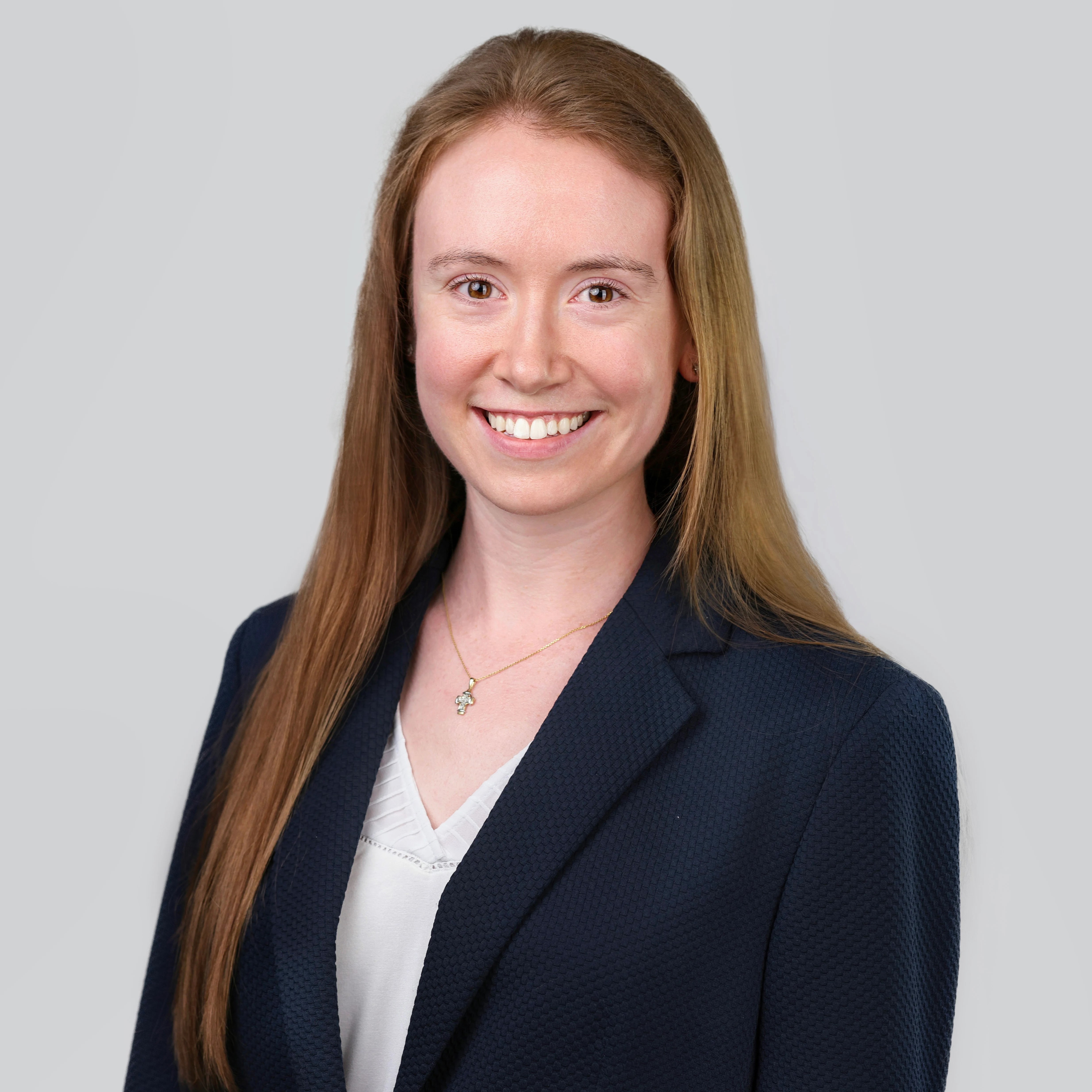 Colleen Weber, PA-C smiling wearing a blue blazer and white blouse