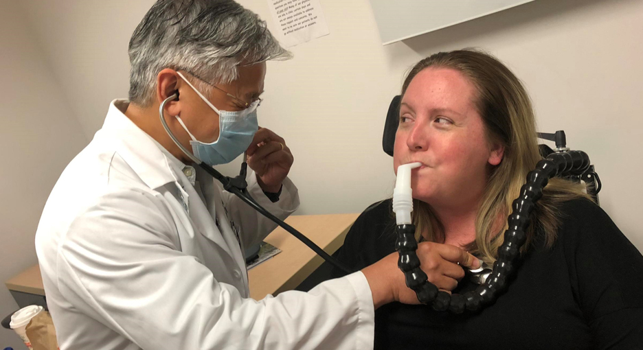 Doctor evaluating patient