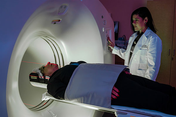 Photo of a patient participating in a PET scan